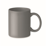 Taza barata publicitaria de cerámica a color 300ml Basic Colors color gris