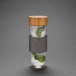 Botellas pequeñas de vidrio personalizadas color transparente vista de ambiente
